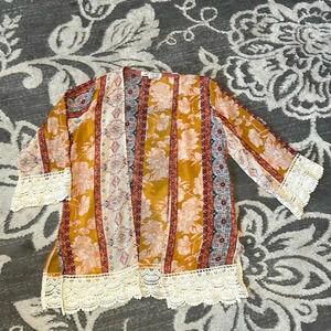 Jolt sheer kimono. Like new. Size XS. Lace hem and on the arms. Dressy or casual